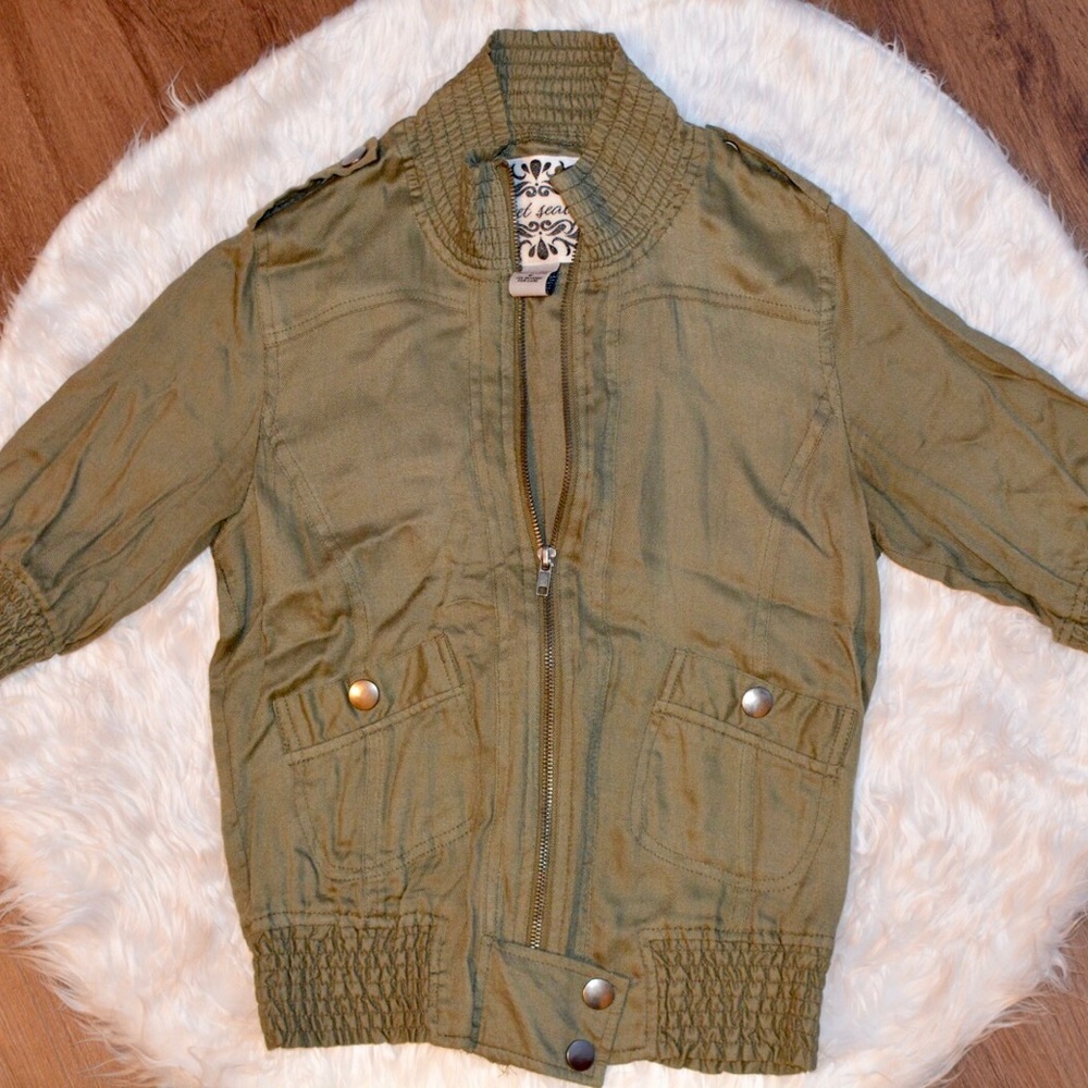 Green zip up jacket